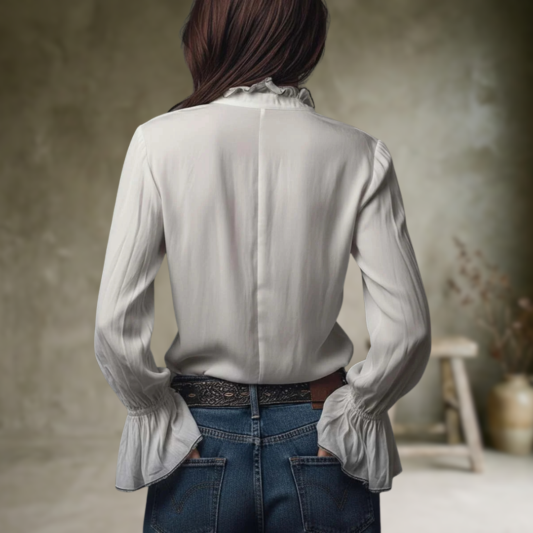 Rica | Blouse blanche à fermeture éclair sur le devant et poignets à volants
