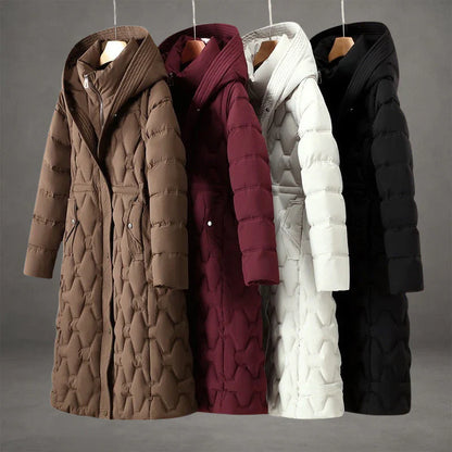 Nour | Long manteau matelassé chic à capuche