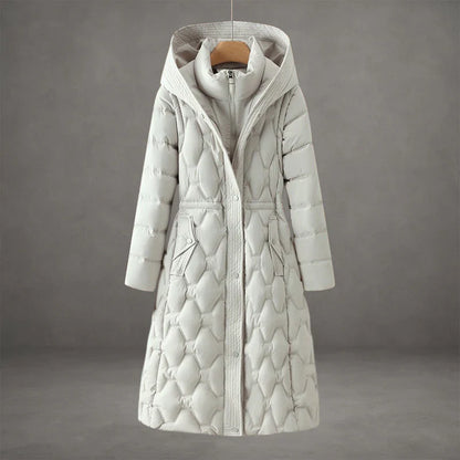 Nour | Long manteau matelassé chic à capuche